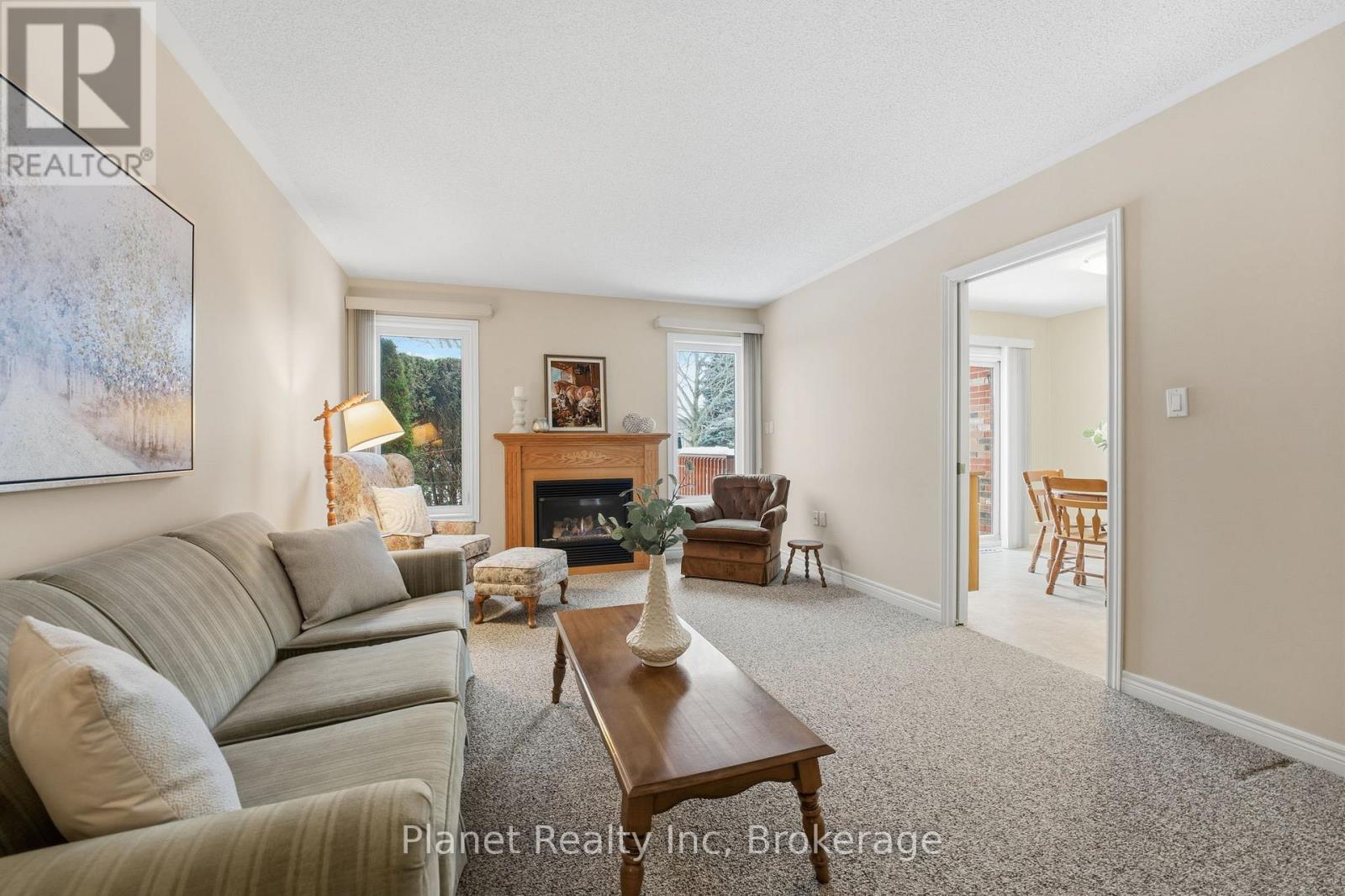 97 Basswood Drive, Guelph (Village By The Arboretum), ON - Indoor Photo Showing Living Room With Fireplace