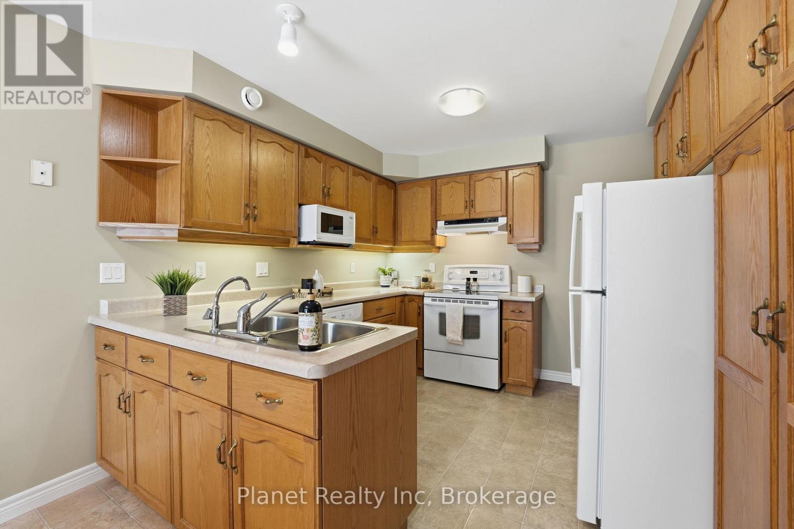 97 Basswood Drive, Guelph (Village By The Arboretum), ON - Indoor Photo Showing Kitchen With Double Sink