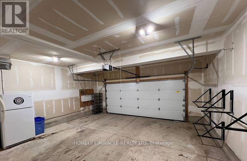 151 Agnes Street, Thames Centre, ON - Indoor Photo Showing Garage