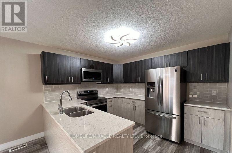 151 Agnes Street, Thames Centre, ON - Indoor Photo Showing Kitchen With Double Sink With Upgraded Kitchen