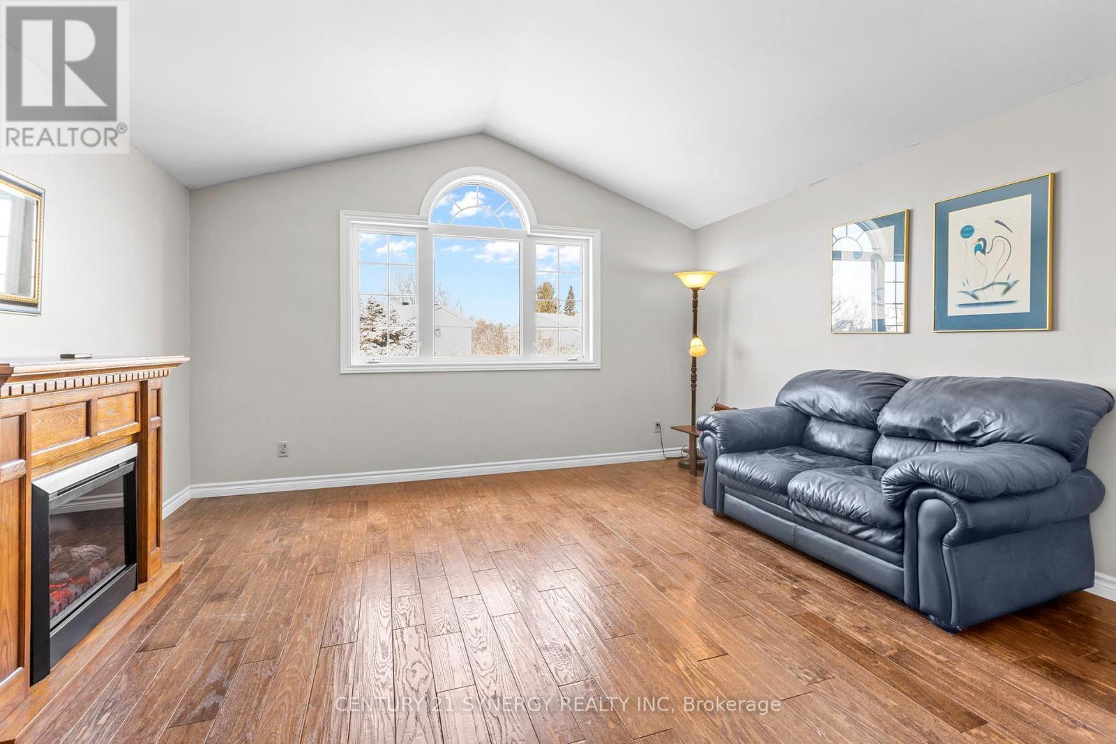 34 Rosegarden Crescent, Ottawa, ON - Indoor Photo Showing Living Room With Fireplace