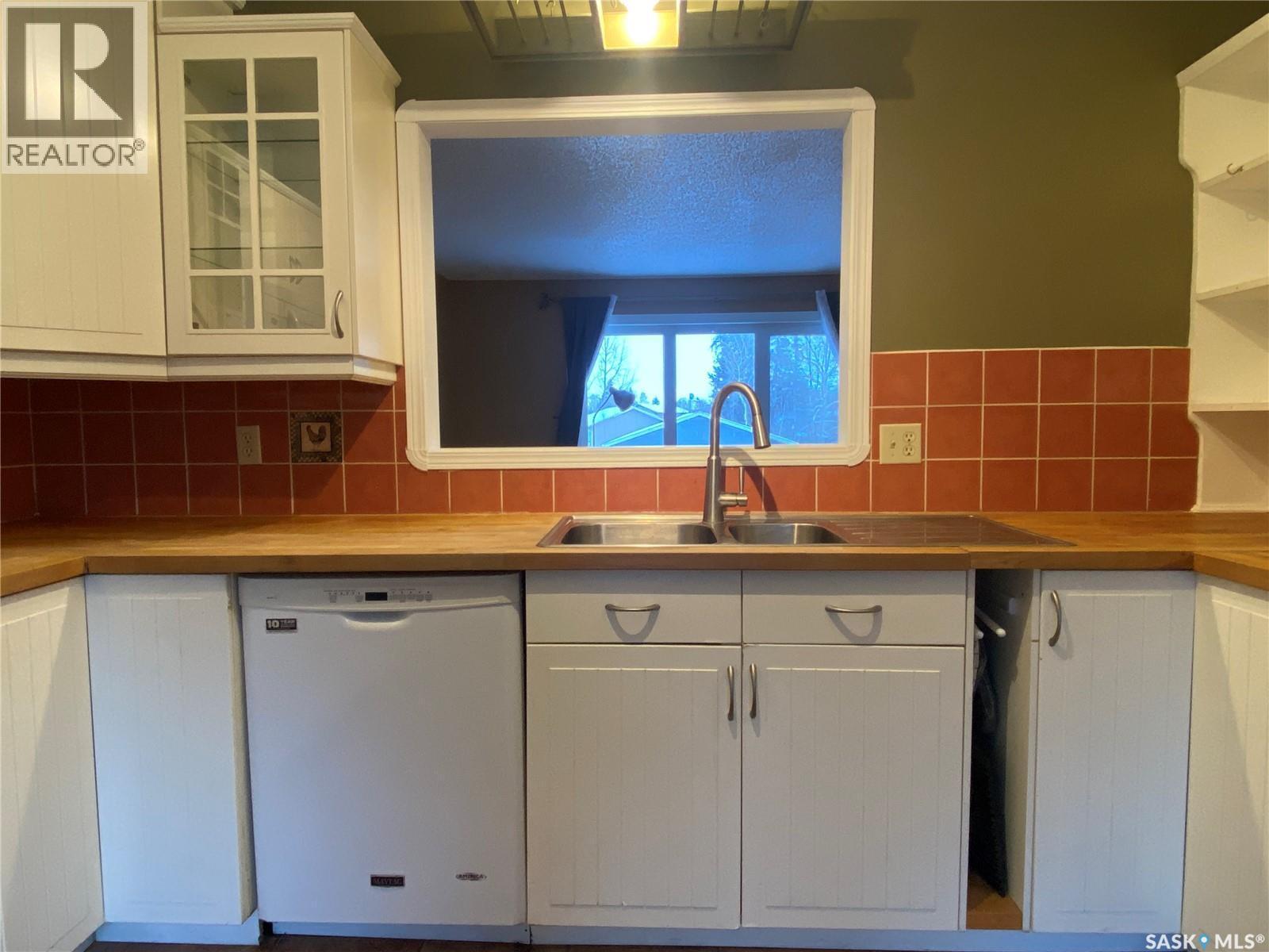 928 Quandt Crescent, La Ronge, SK - Indoor Photo Showing Kitchen With Double Sink