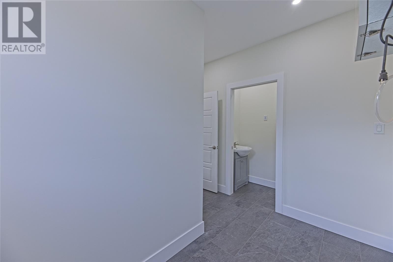 24-30 Carol Crescent, Paradise, NL - Indoor Photo Showing Other Room