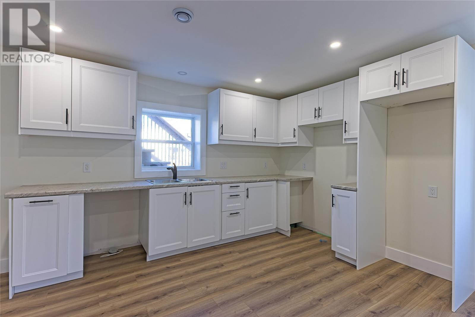 24-30 Carol Crescent, Paradise, NL - Indoor Photo Showing Kitchen With Double Sink