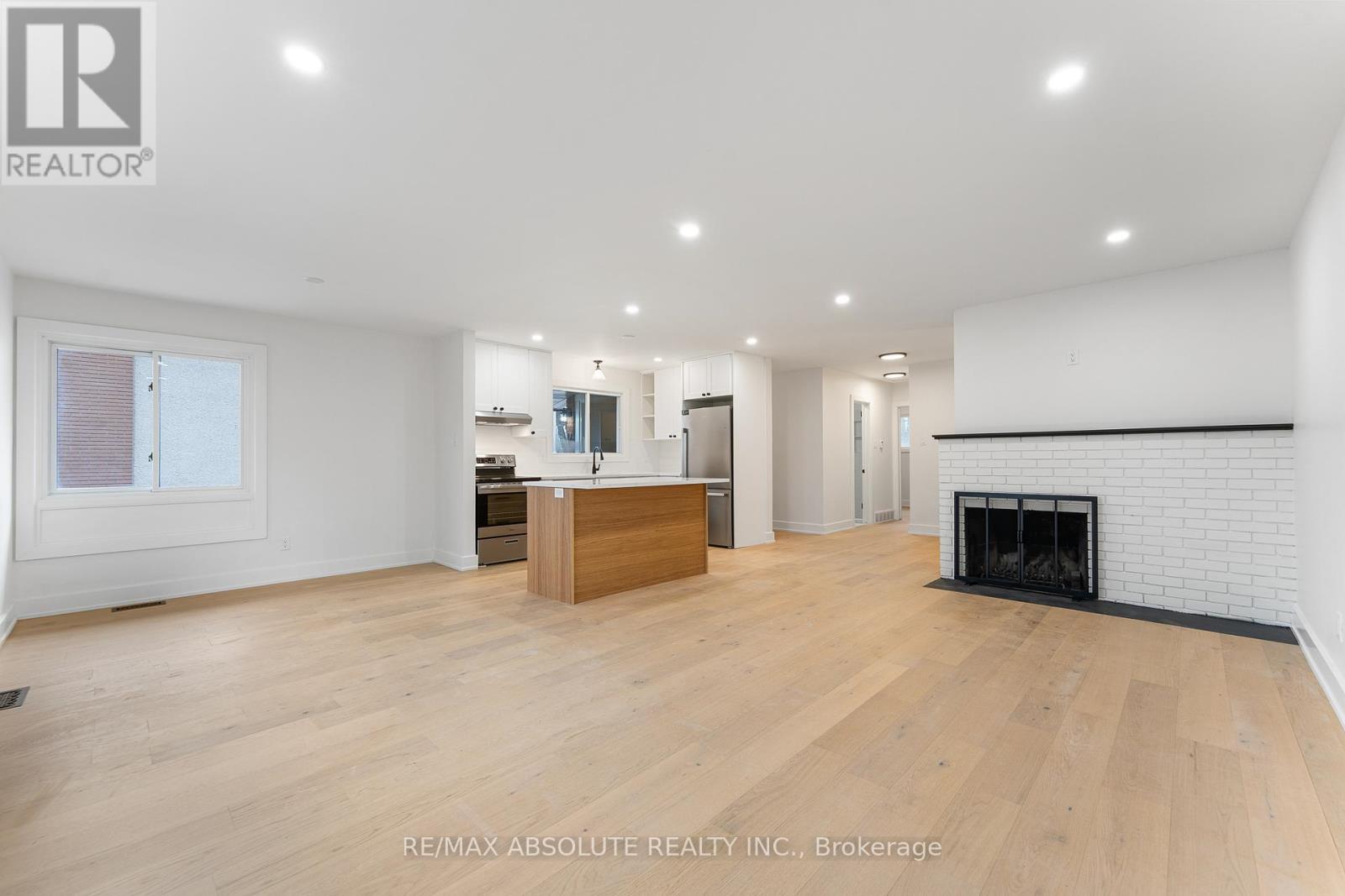 14 Mulvagh Avenue, Ottawa, ON - Indoor Photo Showing Living Room With Fireplace
