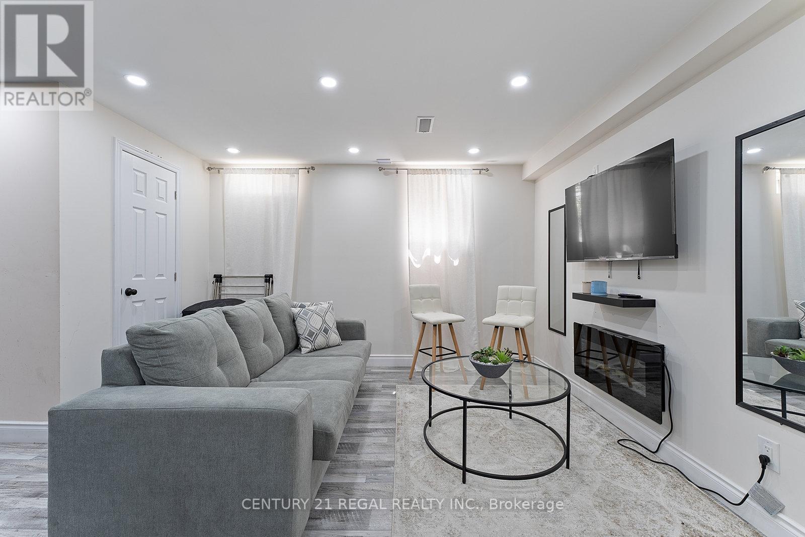 Lower - 43 Tollgate Street, Brampton, ON - Indoor Photo Showing Living Room With Fireplace