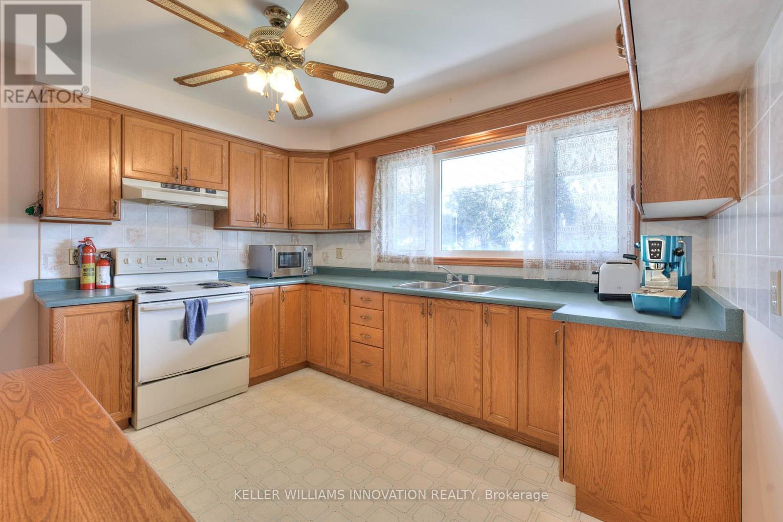 virtually staged - 406 Franklin Street N, Kitchener, ON - Indoor Photo Showing Kitchen With Double Sink