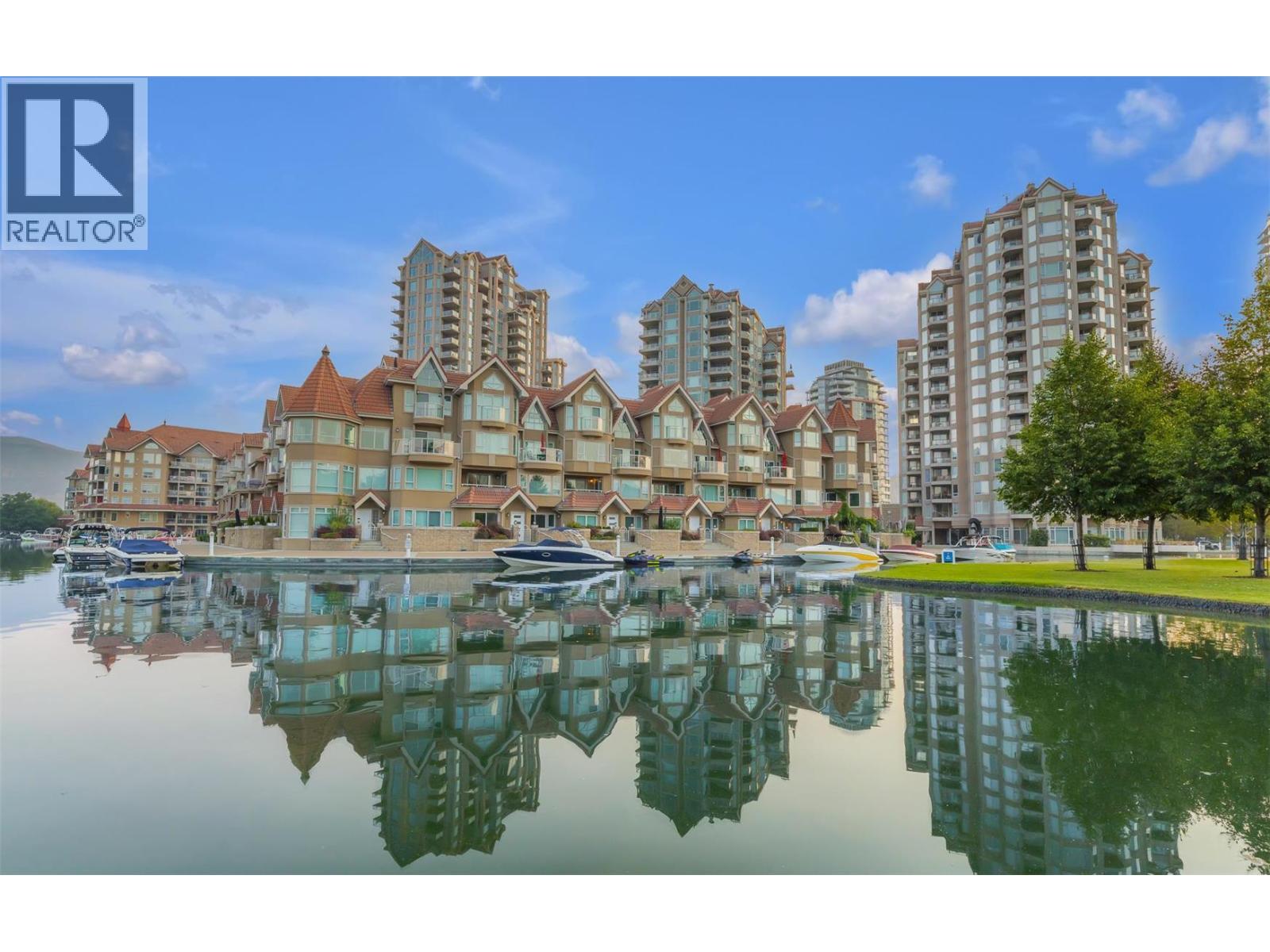 1128 Sunset Drive Unit# 401, Kelowna, BC - Outdoor With Body Of Water With Facade