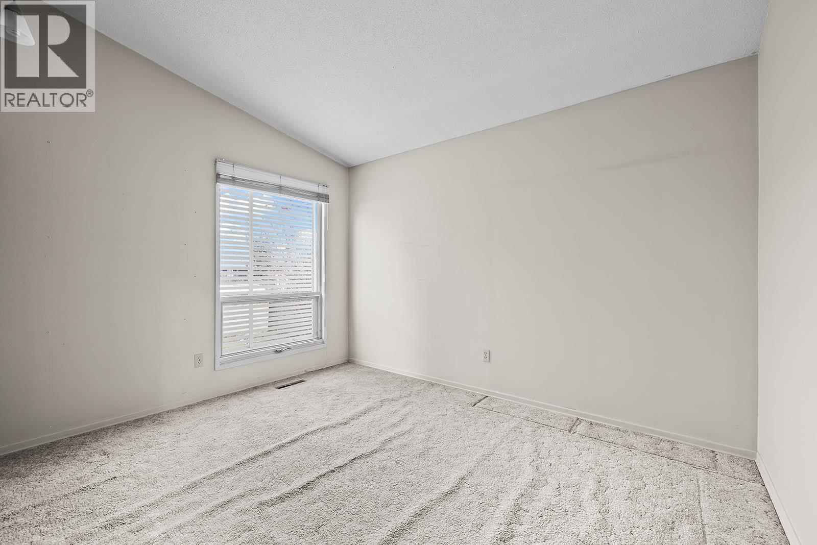 1424 Lombardy Square, Kelowna, BC - Indoor Photo Showing Other Room