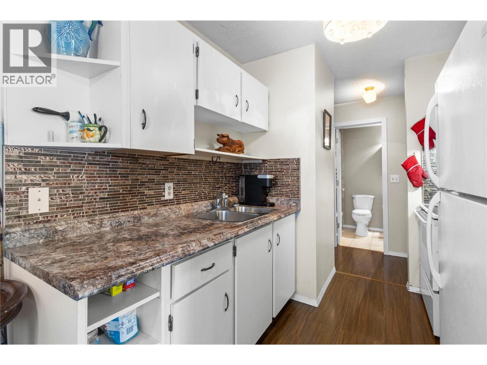 409 Main Street Unit# 204, Sicamous, BC - Indoor Photo Showing Kitchen With Double Sink