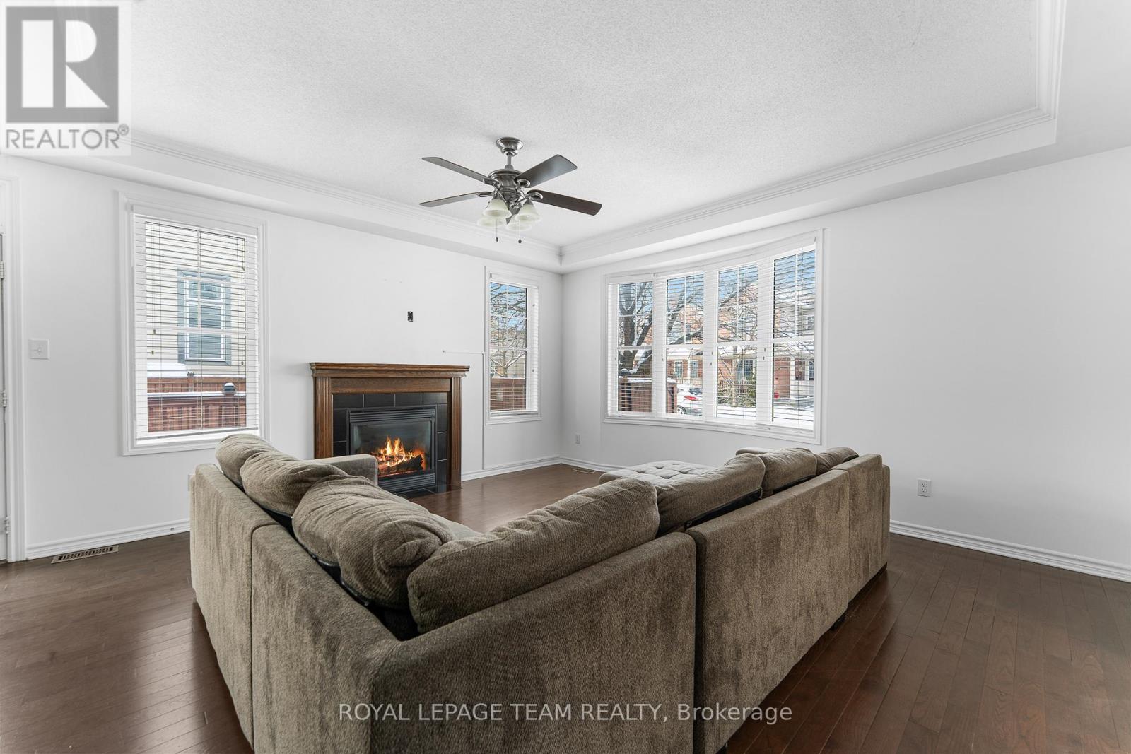 221 Kohilo Crescent, Ottawa, ON - Indoor Photo Showing Living Room With Fireplace