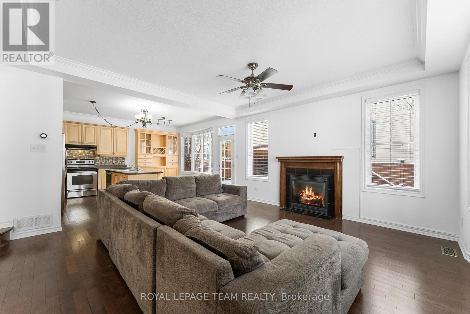 221 Kohilo Crescent, Ottawa, ON - Indoor Photo Showing Living Room With Fireplace