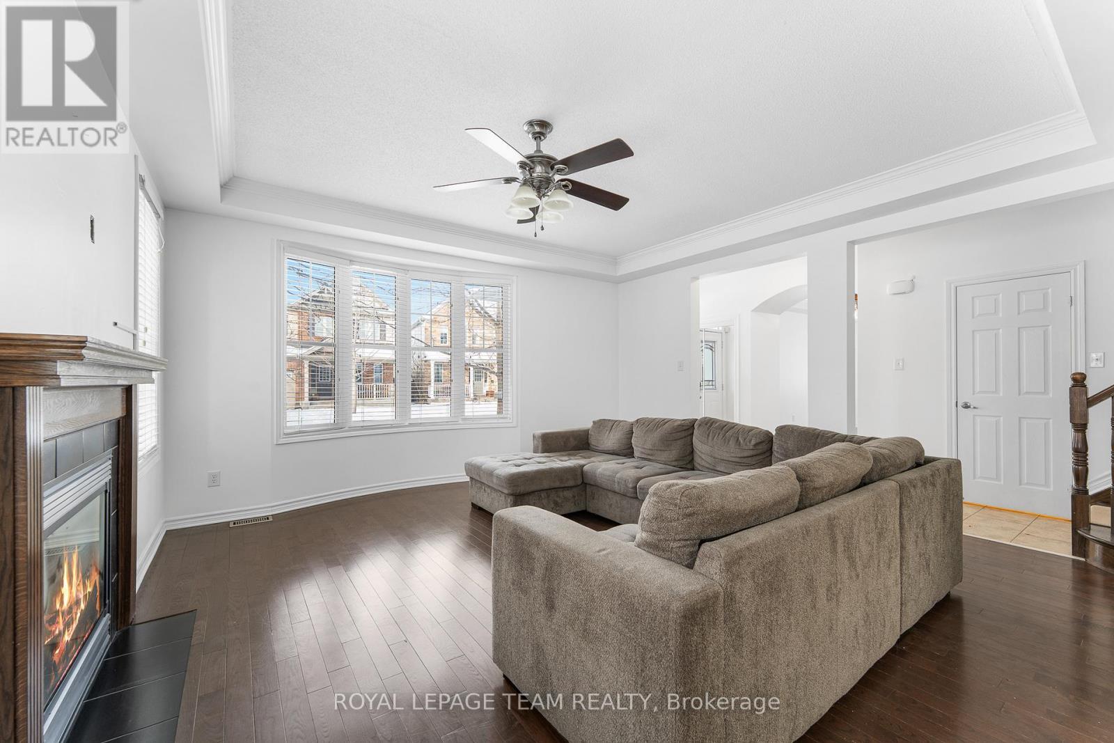 221 Kohilo Crescent, Ottawa, ON - Indoor Photo Showing Living Room With Fireplace