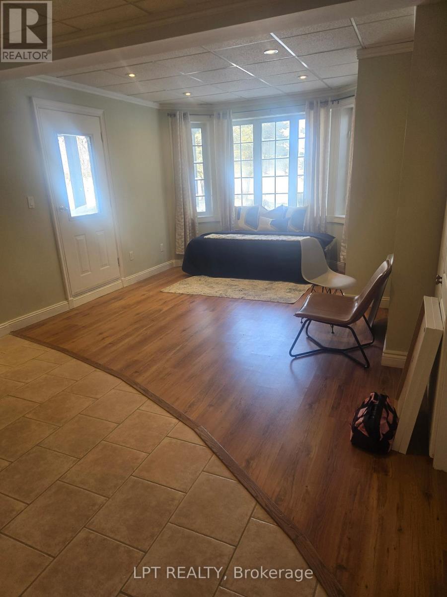 Bay window with view of yard - Lower Level - 14195 Mount Hope Road E, Caledon, ON - Indoor Photo Showing Other Room