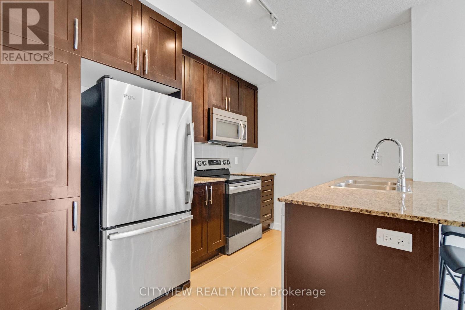3609 - 4070 Confederation Parkway, Mississauga, ON - Indoor Photo Showing Kitchen With Stainless Steel Kitchen With Double Sink