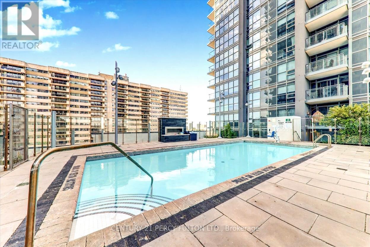 727 - 20 Meadowglen Place, Toronto, ON - Outdoor With In Ground Pool