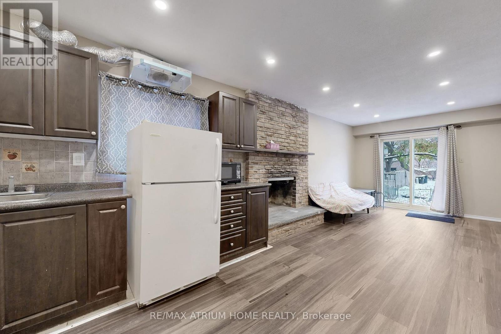 3 Plumbrook Crescent, Toronto, ON - Indoor Photo Showing Kitchen With Fireplace