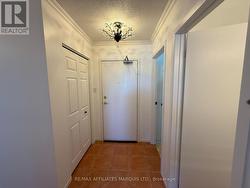 Entrance showing closet and storage areas -