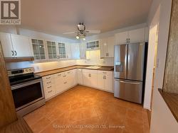 Kitchen with stainless steel appliances. -