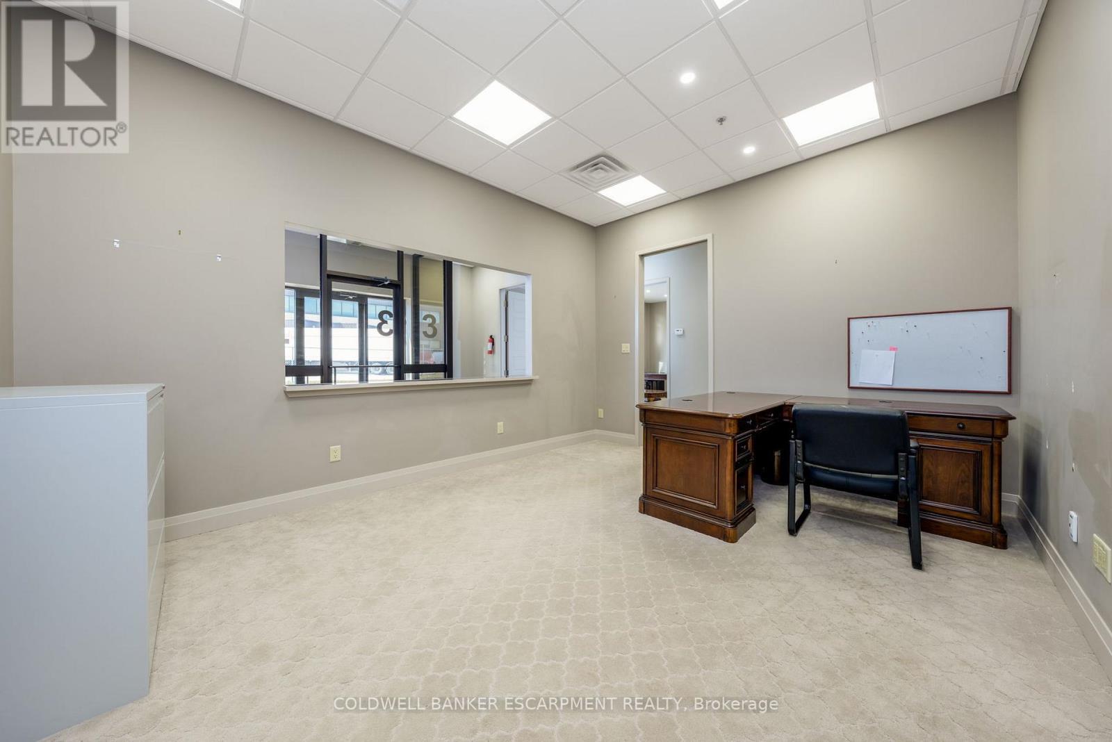 Reception office overlooking lobby - 36 Armstrong Avenue, Halton Hills, ON