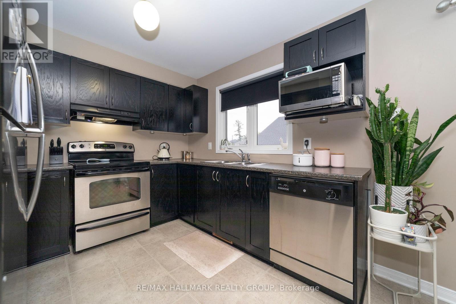 309 Galston Private, Ottawa, ON - Indoor Photo Showing Kitchen With Double Sink