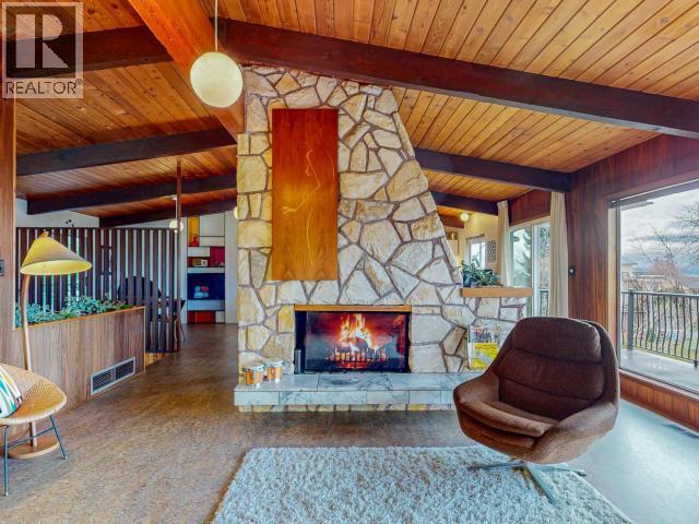 6906 Hammond Street, Powell River, BC - Indoor Photo Showing Living Room With Fireplace