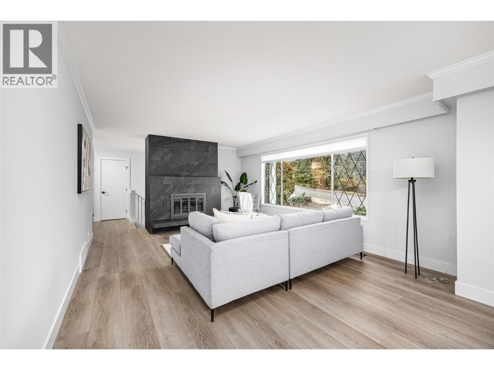 Living Room l Main Level - With gas fire place - 2757 Paula Road, West Kelowna, BC - Indoor Photo Showing Living Room With Fireplace