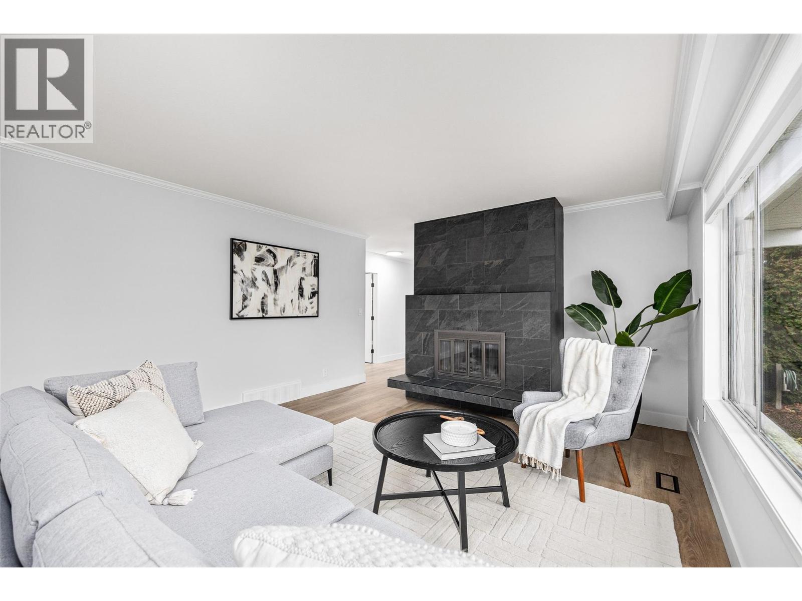 Living Room l Main Level - With gas fire place - 2757 Paula Road, West Kelowna, BC - Indoor Photo Showing Living Room With Fireplace