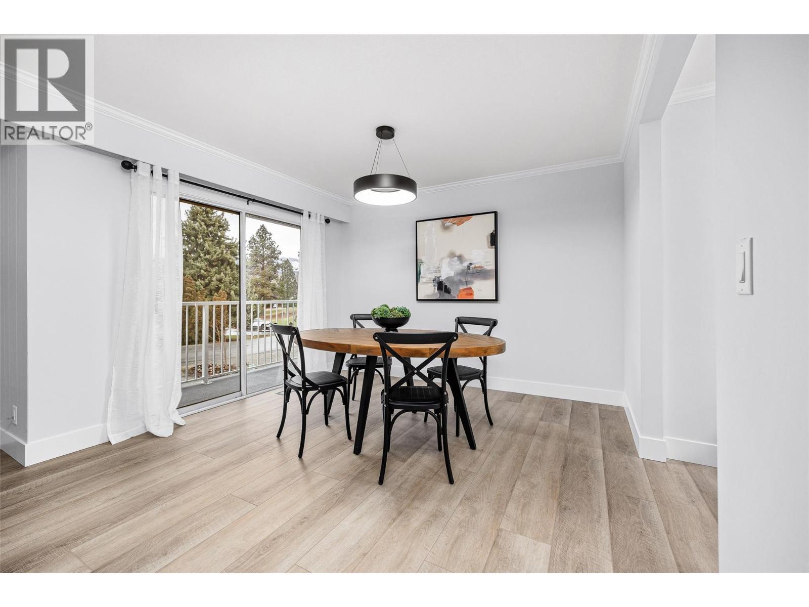 Dining Area l Main Level - With access to main level wrap around patio - 2757 Paula Road, West Kelowna, BC - Indoor Photo Showing Dining Room