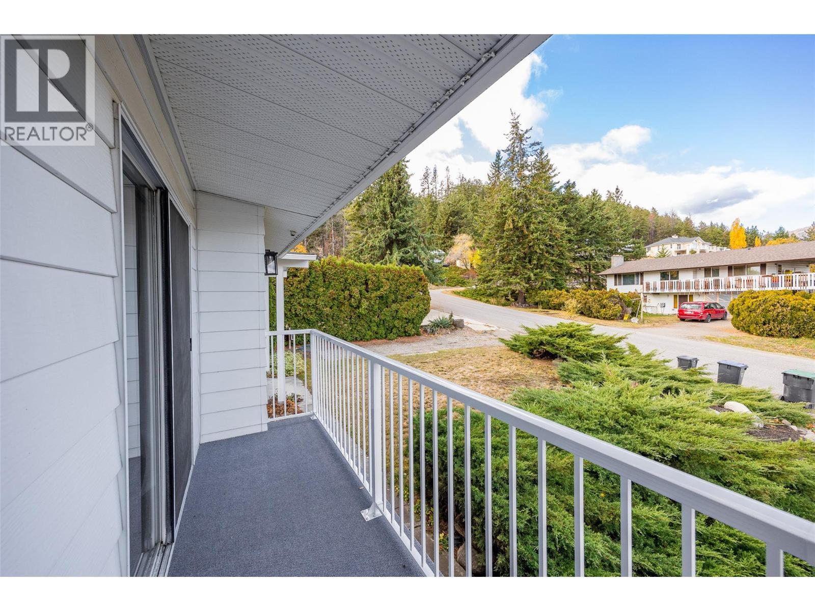 Access to wrap around main level deck - 2757 Paula Road, West Kelowna, BC - Outdoor With Exterior