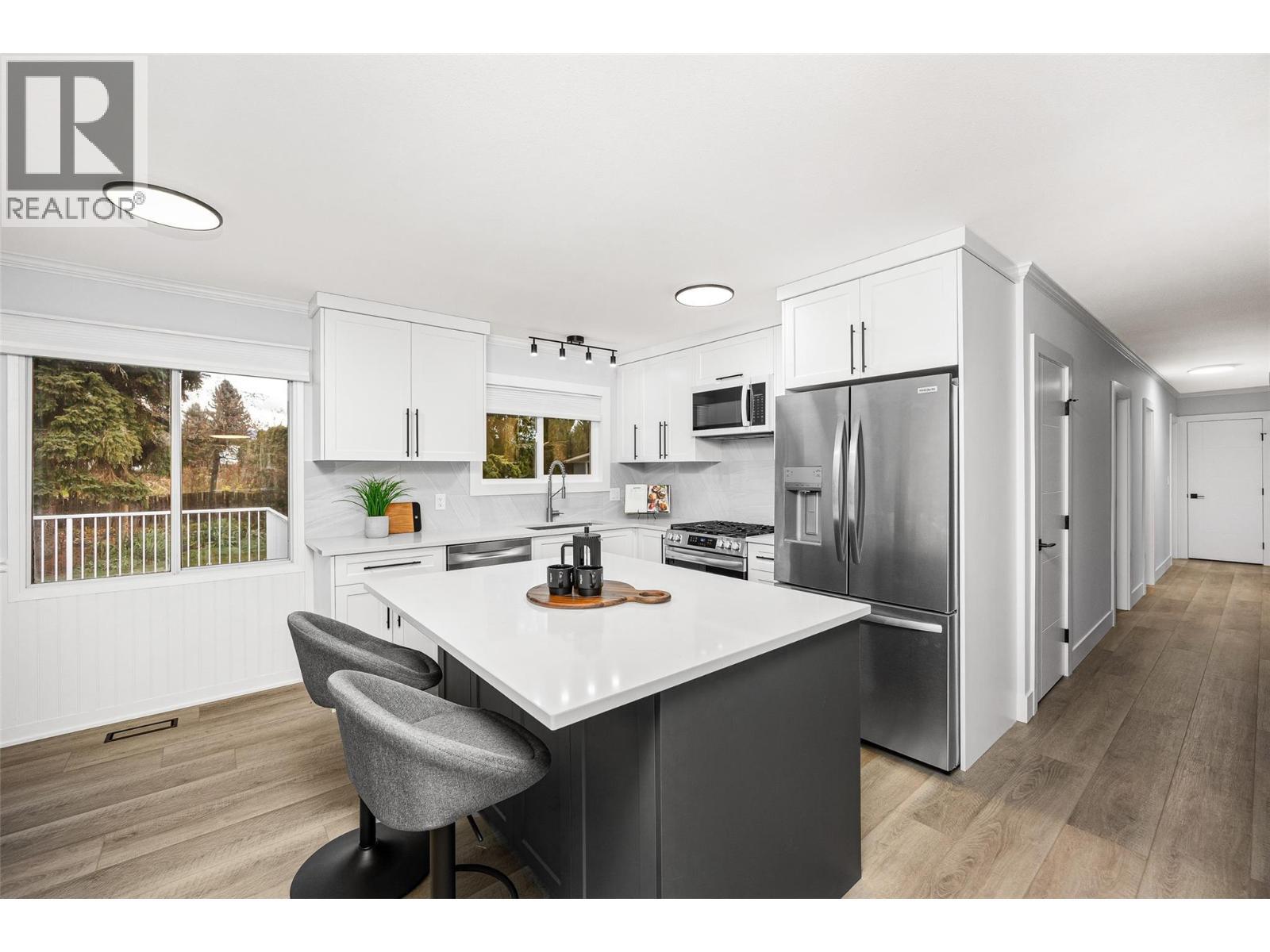 Fully Updated kitchen l Main level - 2757 Paula Road, West Kelowna, BC - Indoor Photo Showing Kitchen With Stainless Steel Kitchen
