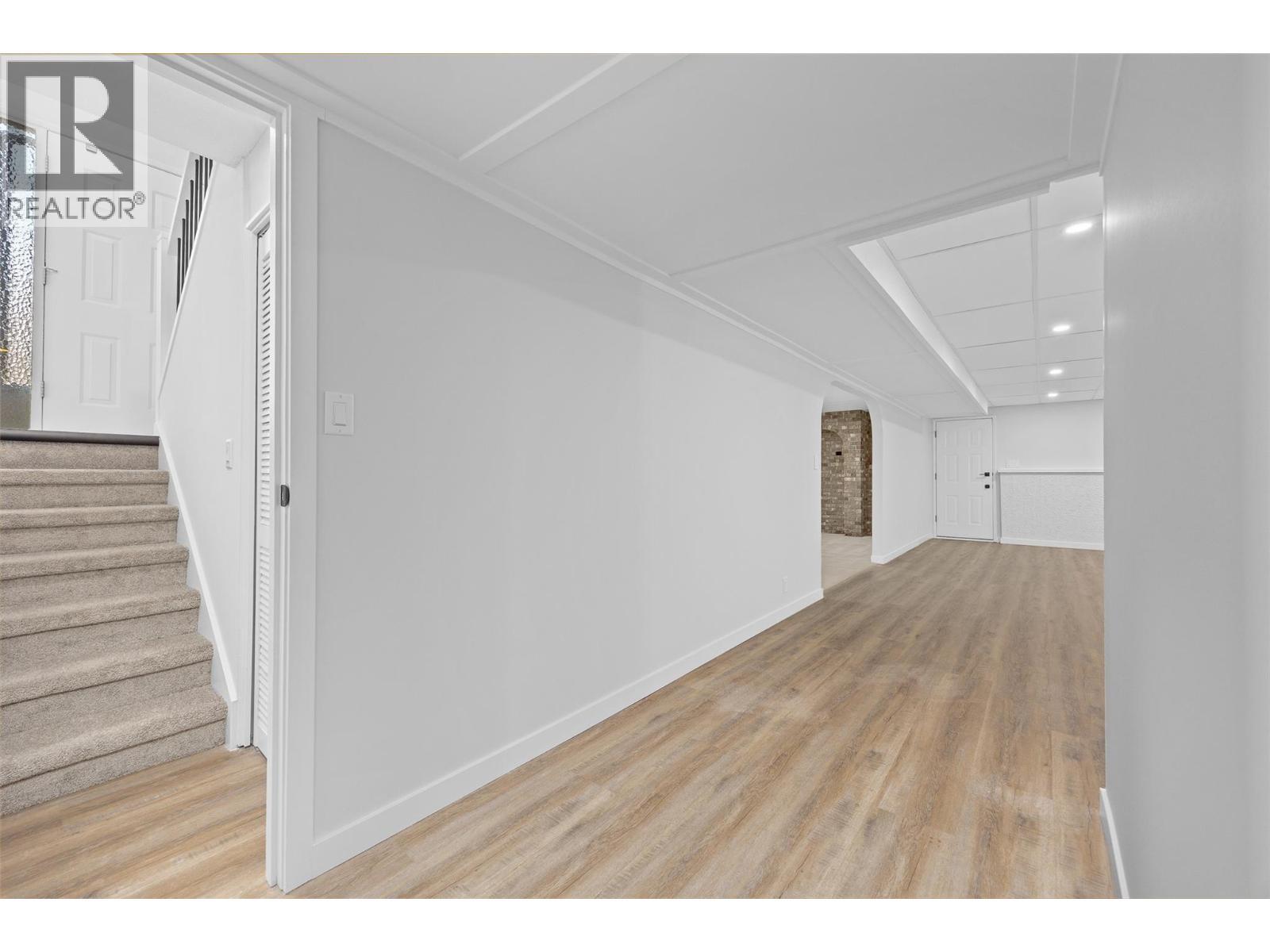 Access to spacious lower level - 2757 Paula Road, West Kelowna, BC - Indoor Photo Showing Other Room