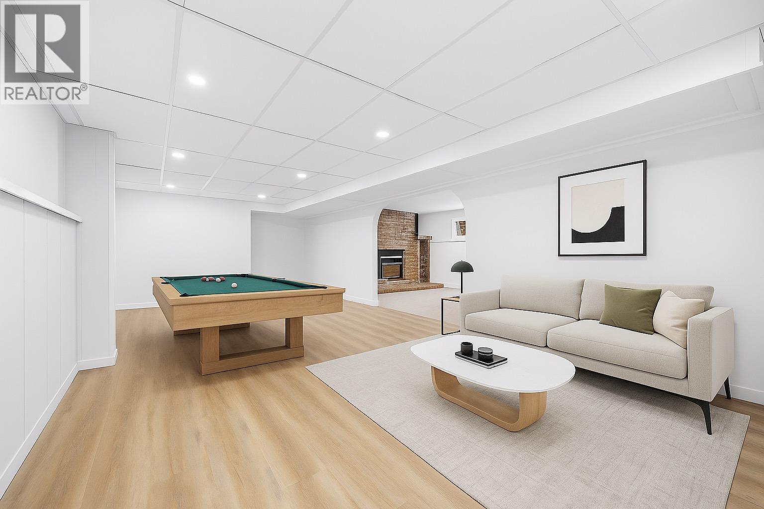 Rec Room l Lower Level - **VIRTUALLY STAGED & AI GENERATED** - 2757 Paula Road, West Kelowna, BC - Indoor