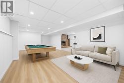 Rec Room l Lower Level - **VIRTUALLY STAGED & AI GENERATED** -