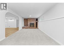 Family Room l Lower Level - With gas fireplace -