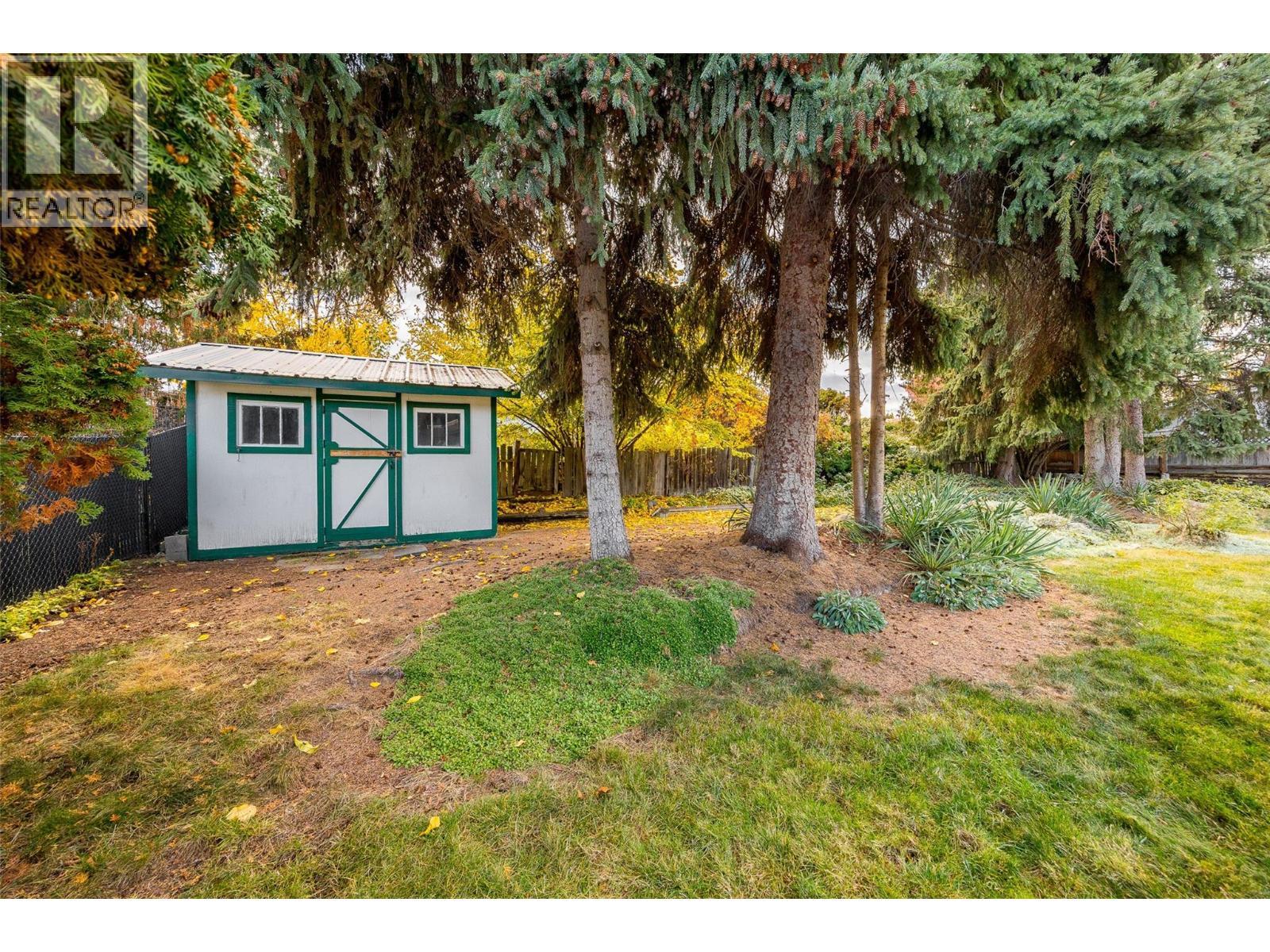 Spacious backyard space completed with fire pit, shed and pool potential! - 2757 Paula Road, West Kelowna, BC - Outdoor