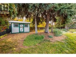 Spacious backyard space completed with fire pit, shed and pool potential! -