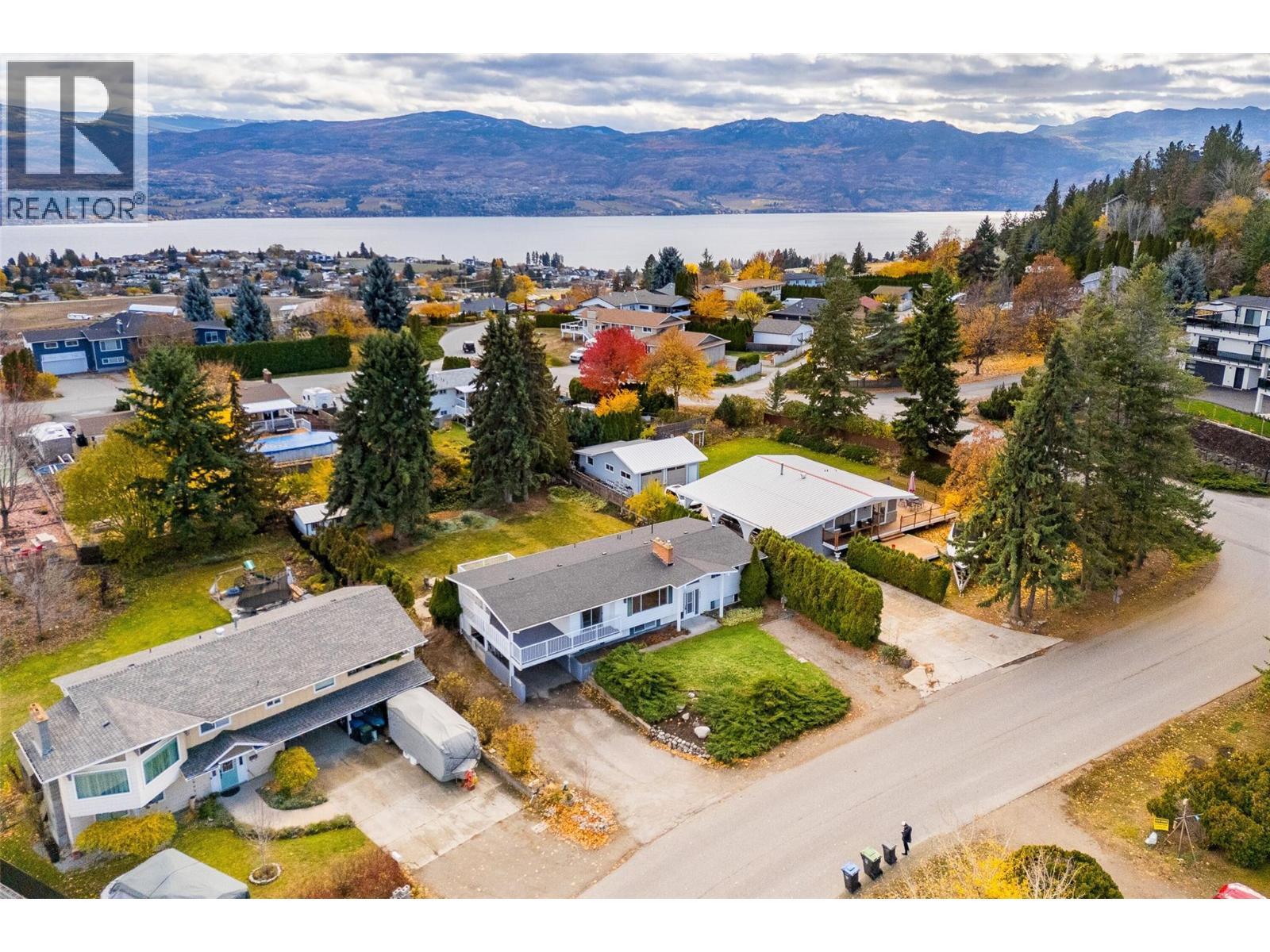 Updated 4 bed/3 bath home located on a sprawling .28 acre-lot in Lakeview Heights - 2757 Paula Road, West Kelowna, BC - Outdoor With Body Of Water With View