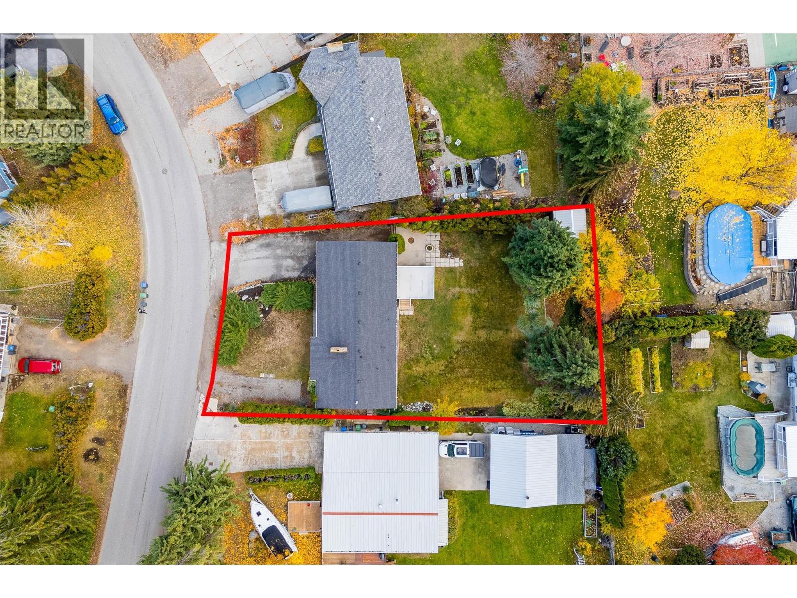 Set on a sprawling .28 acre lot, the property provides plenty of space for entertaining, kids, pets, and even a potential pool - 2757 Paula Road, West Kelowna, BC - Outdoor With View
