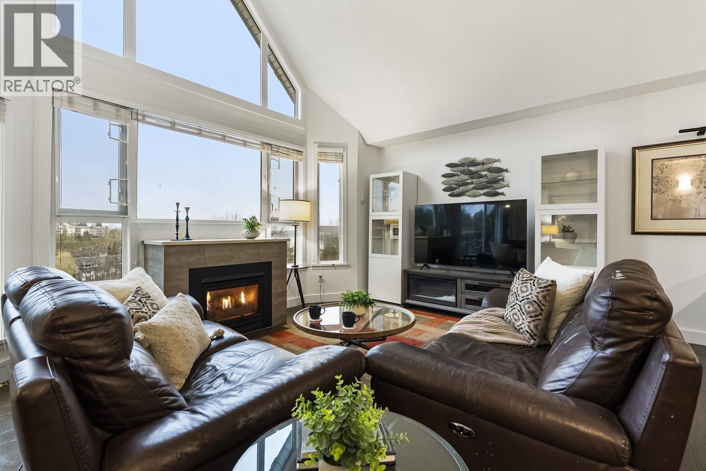 412 11595 Fraser Street, Maple Ridge, BC - Indoor Photo Showing Living Room With Fireplace