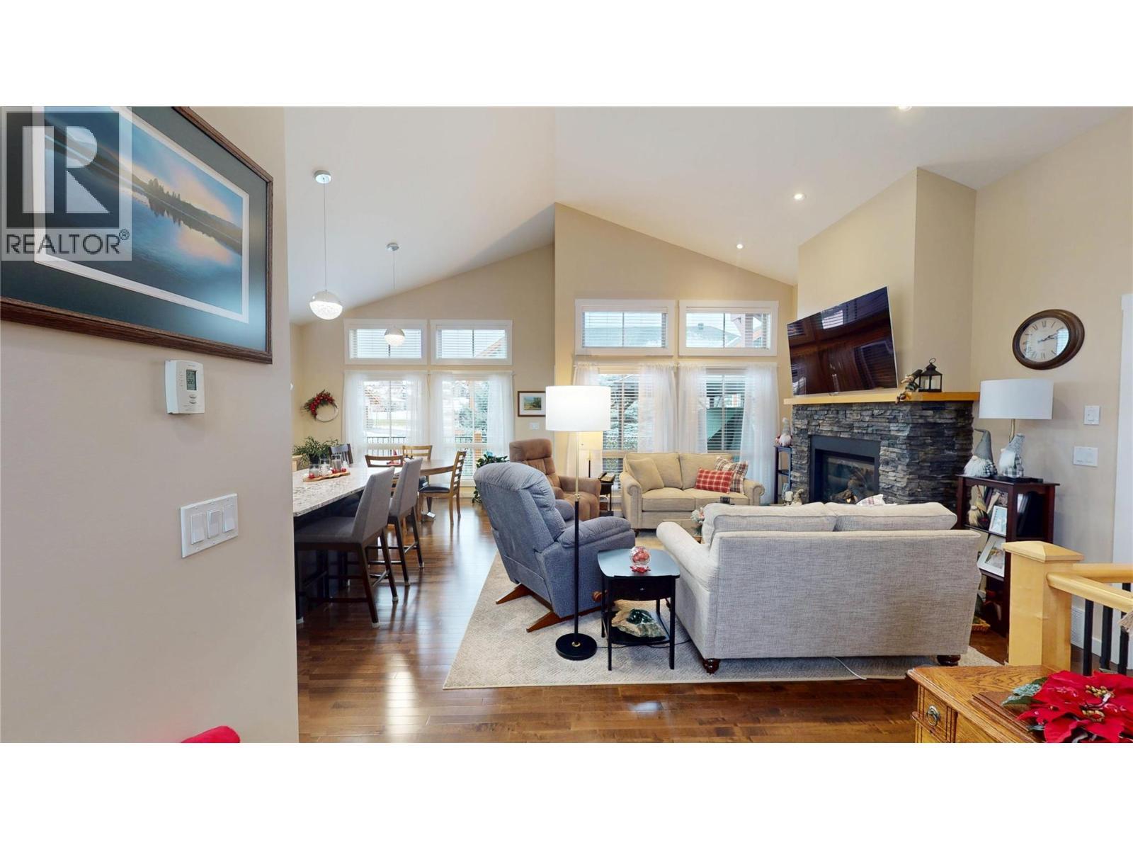 223 Boulder Creek, Cranbrook, BC - Indoor Photo Showing Living Room With Fireplace