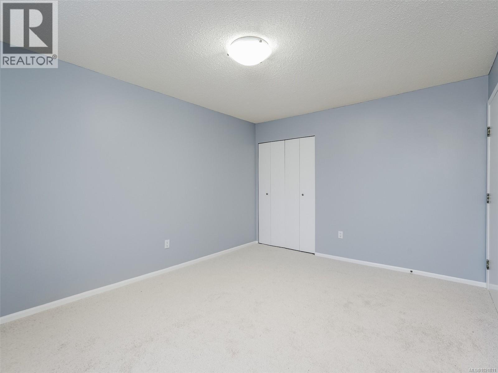 Primary Bedroom - 302 859 Carrie St, Esquimalt, BC - Indoor Photo Showing Other Room