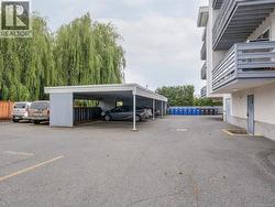 View of partially covered parking lot -