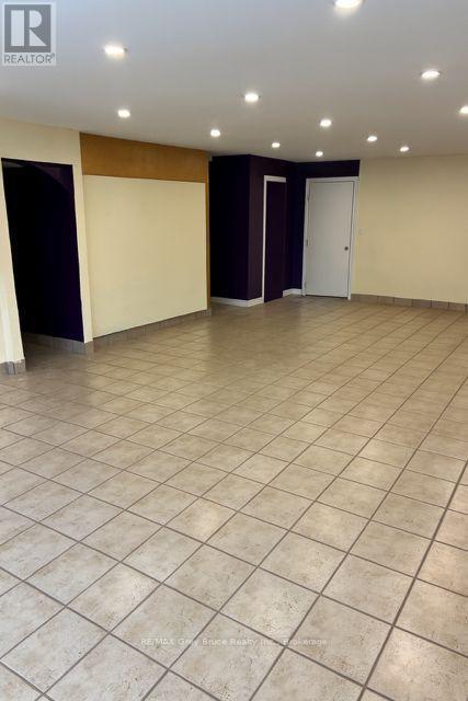 Artificially Staged to remove items - 1071 2Nd Avenue E, Owen Sound, ON