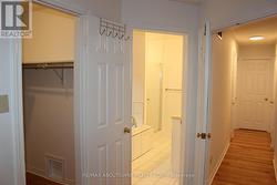 The Walk-in Closet and Ensuite. Hallway w/closets -