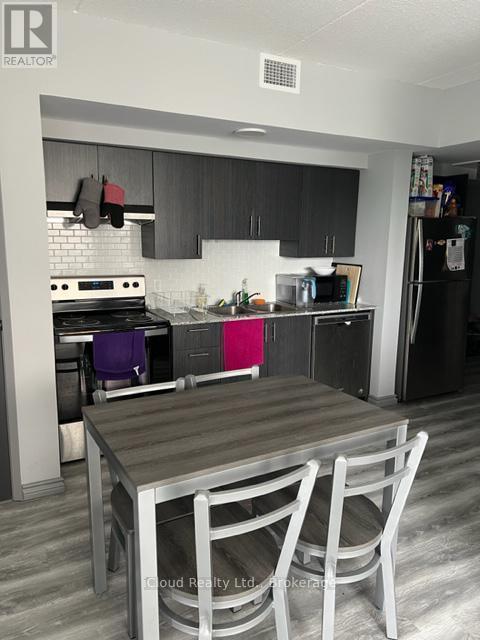 H401 - 275 Larch Street, Waterloo, ON - Indoor Photo Showing Kitchen With Double Sink