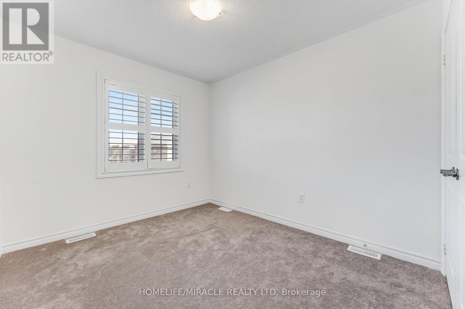 117 Stocks Avenue, Southgate, ON - Indoor Photo Showing Other Room