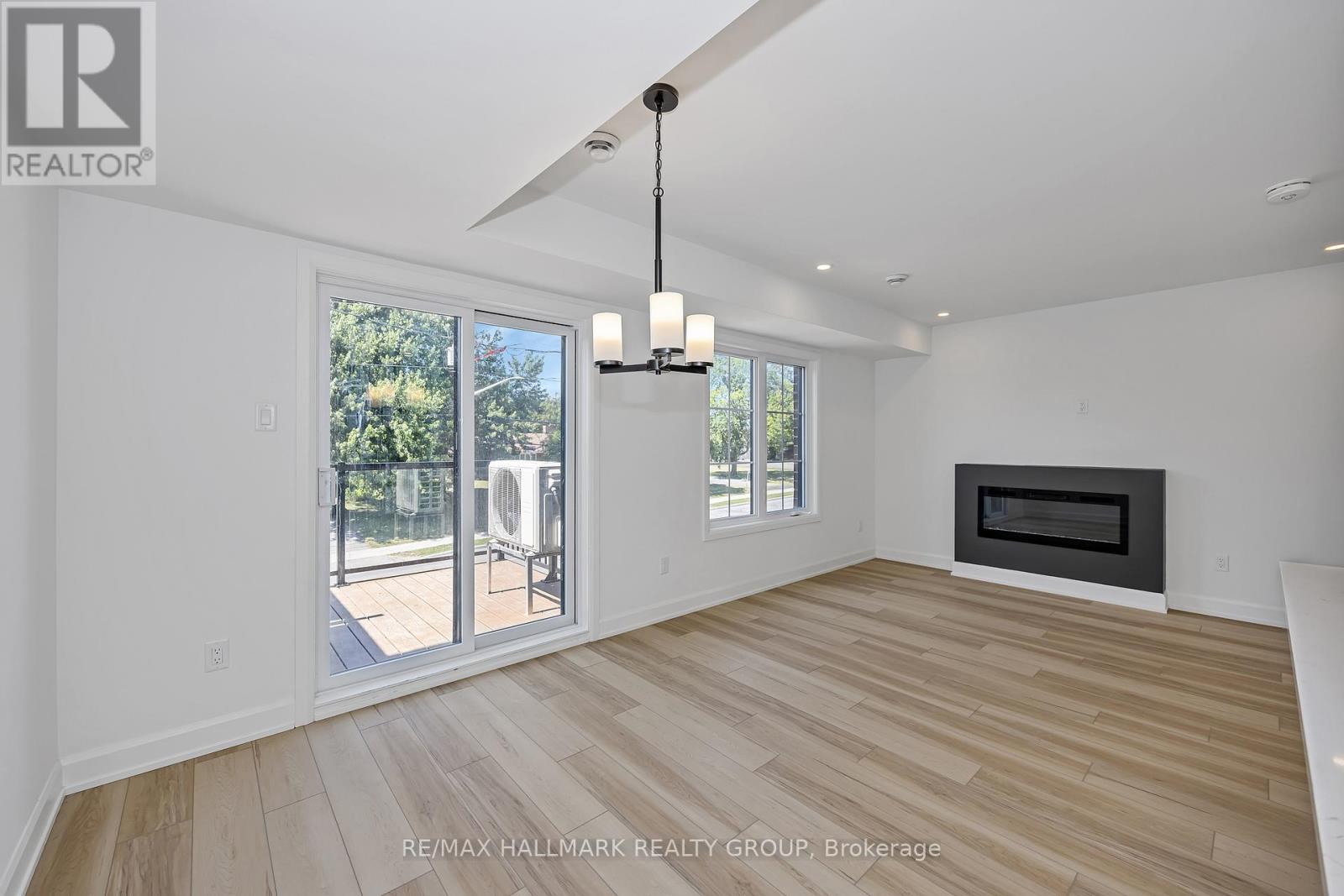 6104 Renaud Rd, Ottawa, ON - Indoor Photo Showing Living Room With Fireplace