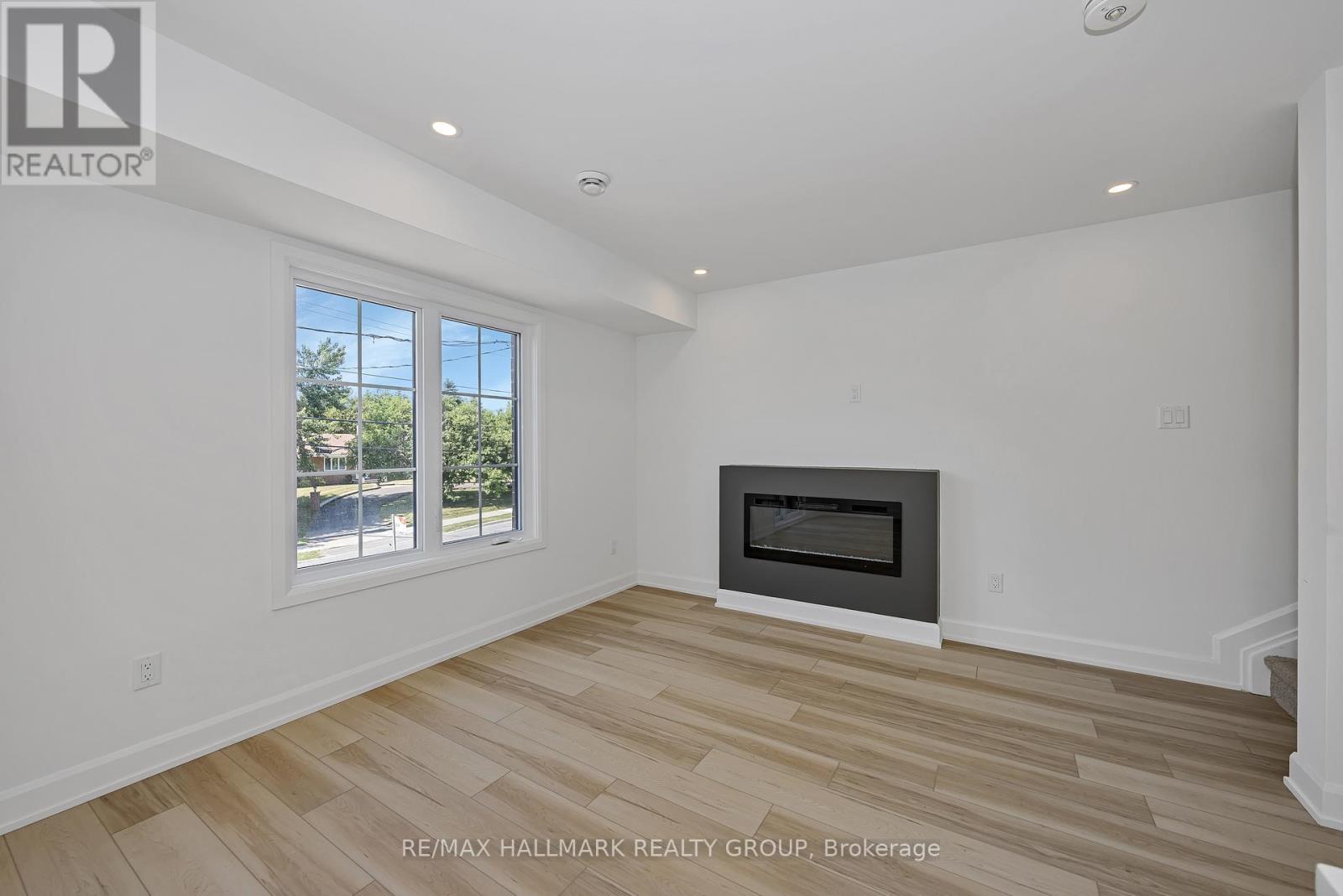 6104 Renaud Rd, Ottawa, ON - Indoor Photo Showing Other Room With Fireplace