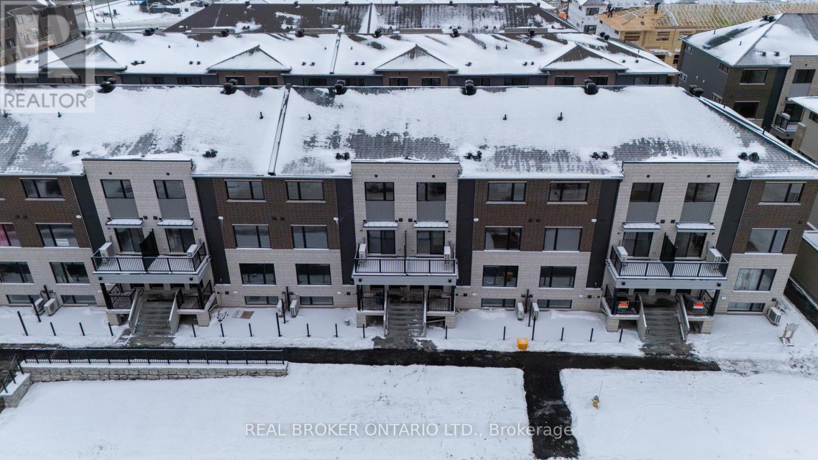10 - 301 Glenroy Gilbert Drive, Ottawa, ON - Outdoor With Balcony With Facade